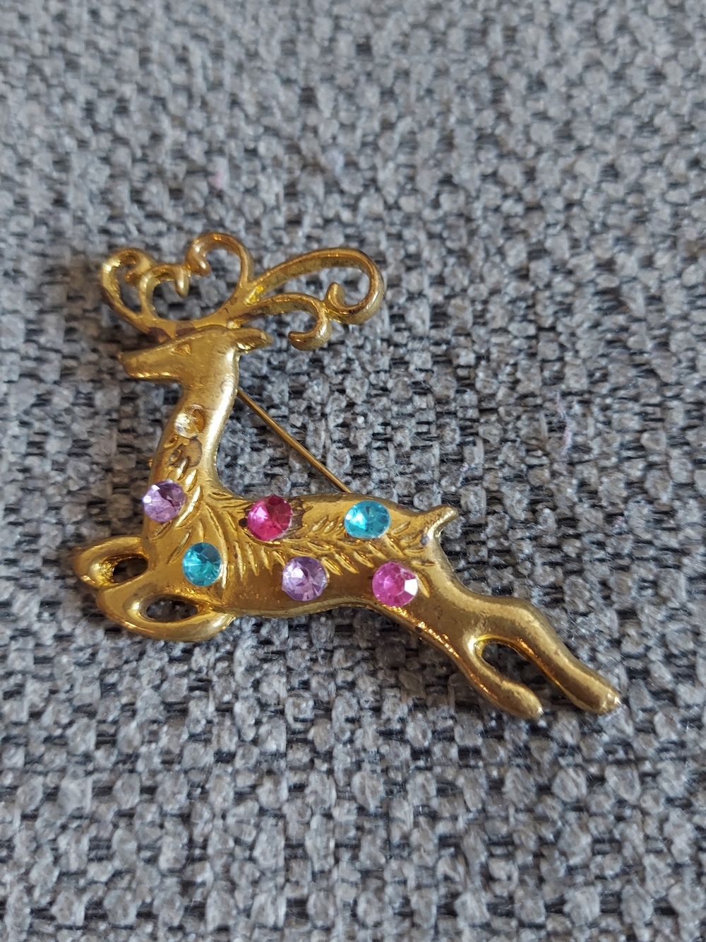 Vintage Gold-tone Reindeer Brooch with Pink, Blue and Purple Rhinestones
